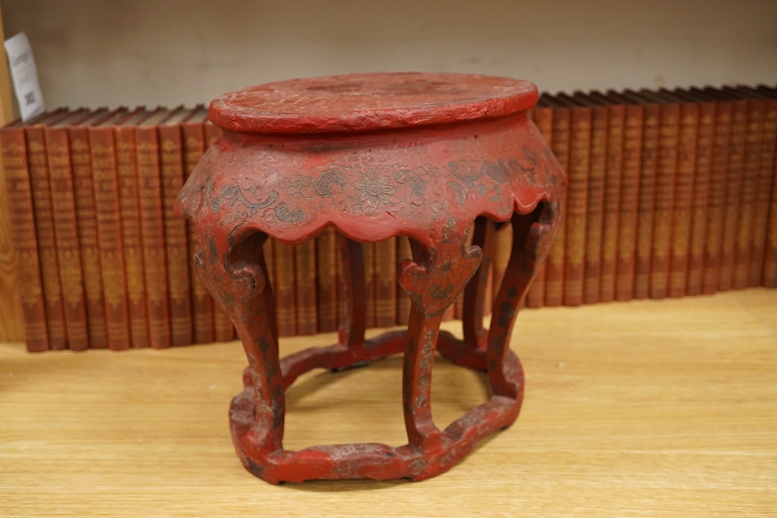 A Chinese red lacquer stand, 24.5cm high